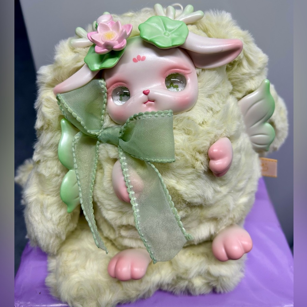 Adorable Fluffy Green Lolan Green Plush with Bow
